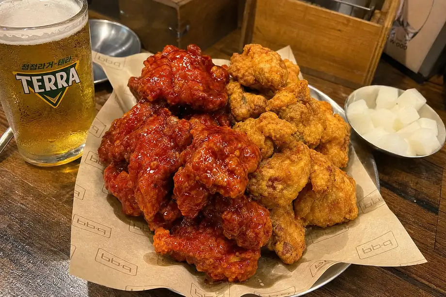 Korean fried chicken chimaek with yangnyeom sauce and beer