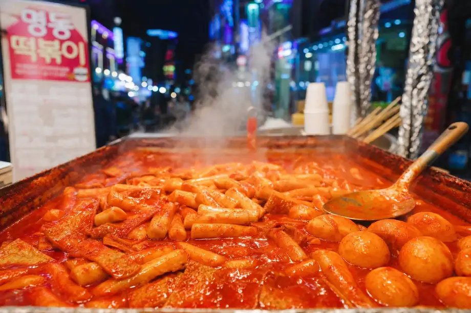 Tteokbokki spicy rice cakes at Myeongdong street food stall at night